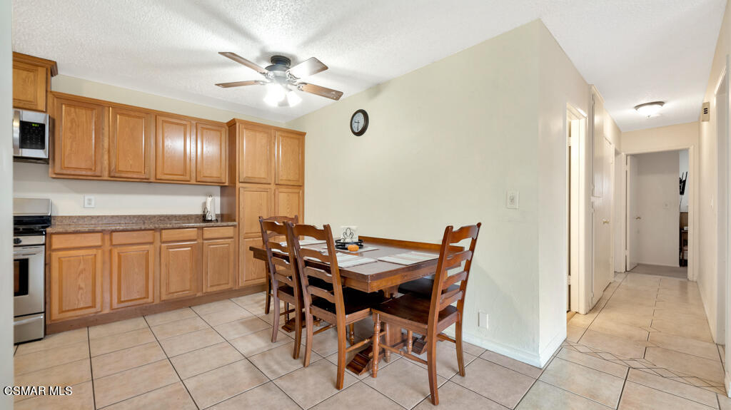 152 Ripley Street Camarillo, CA 93010 - Photo 11 of 36 a view of a dining room with furniture and chandelier