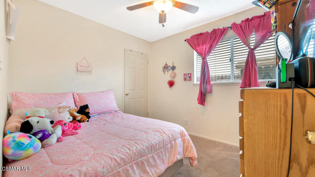 152 Ripley Street Camarillo, CA 93010 - Photo 20 of 36 a bedroom with a bed and a potted plant
