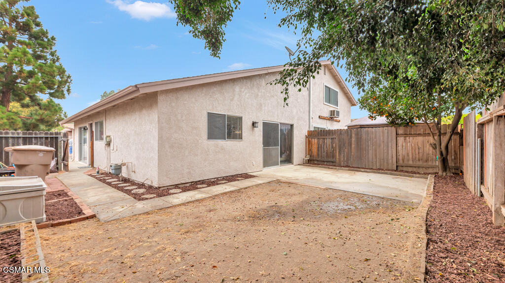 152 Ripley Street Camarillo, CA 93010 - Photo 25 of 36 a white house with a large tree in front of it
