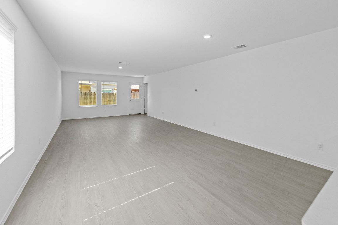 245 Ammolite Lane Maxwell, TX 78656 - Photo 10 of 17 an empty room with windows