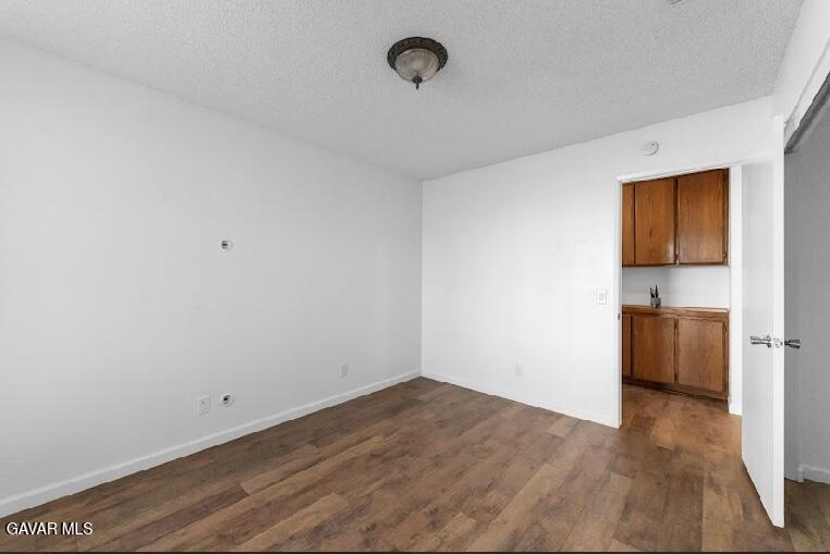 2852 San Ramon Drive Lancaster, CA 93535 - Photo 17 of 32 a view of empty room with wooden floor