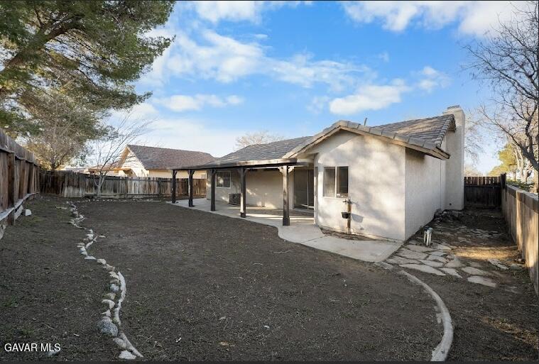 2852 San Ramon Drive Lancaster, CA 93535 - Photo 28 of 32 a view of a house with a yard