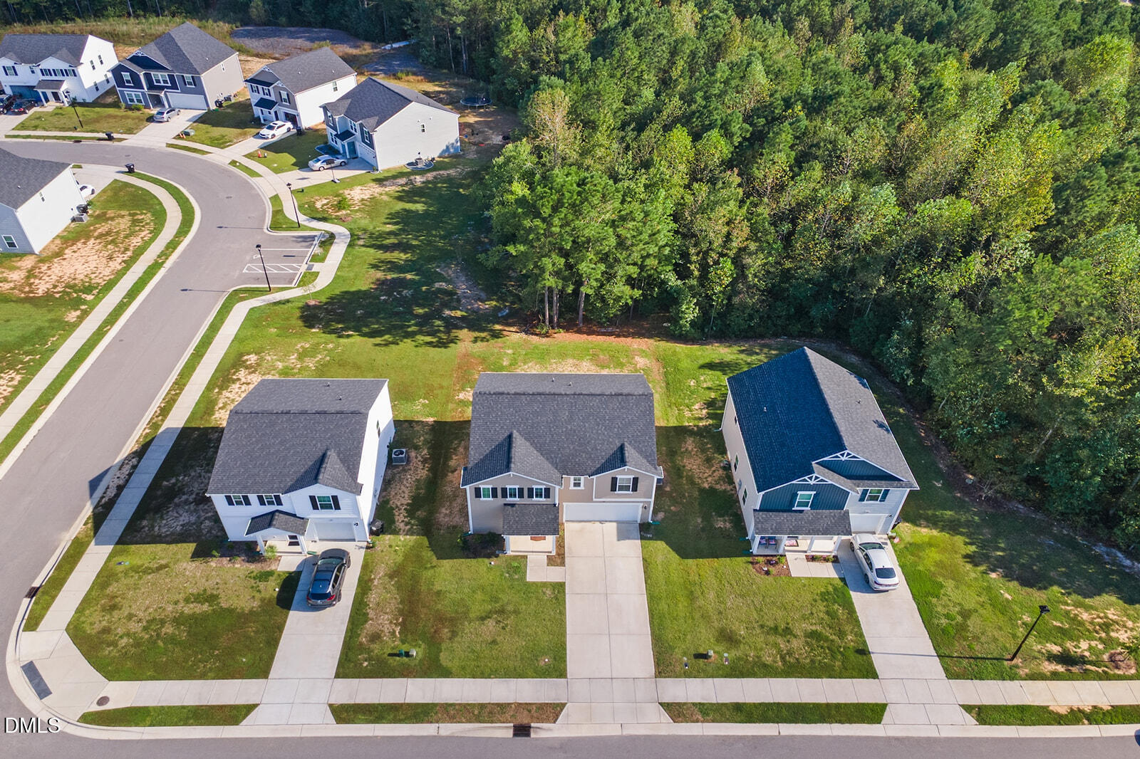 128 Maple Tree Lane Clayton, NC 27527 - Photo 13 of 14 an aerial view of residential houses with outdoor space