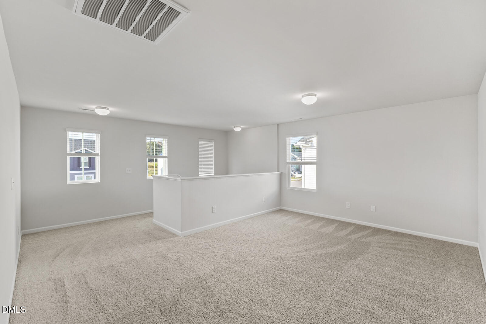 128 Maple Tree Lane Clayton, NC 27527 - Photo 7 of 14 a view of an empty room with a window