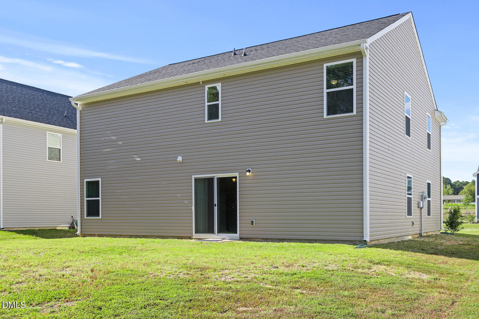 128 Maple Tree Lane Clayton, NC 27527 - Photo 9 of 14 a backyard of a house