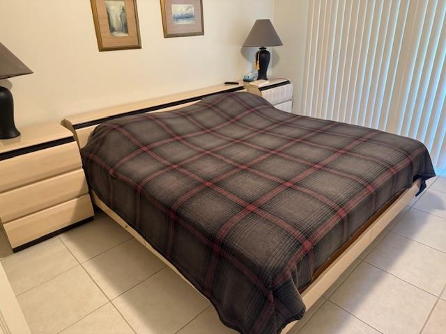 678 Durham, Unit 678 Deerfield Beach, FL 33442 - Photo 6 of 9 a bedroom with a bed and window