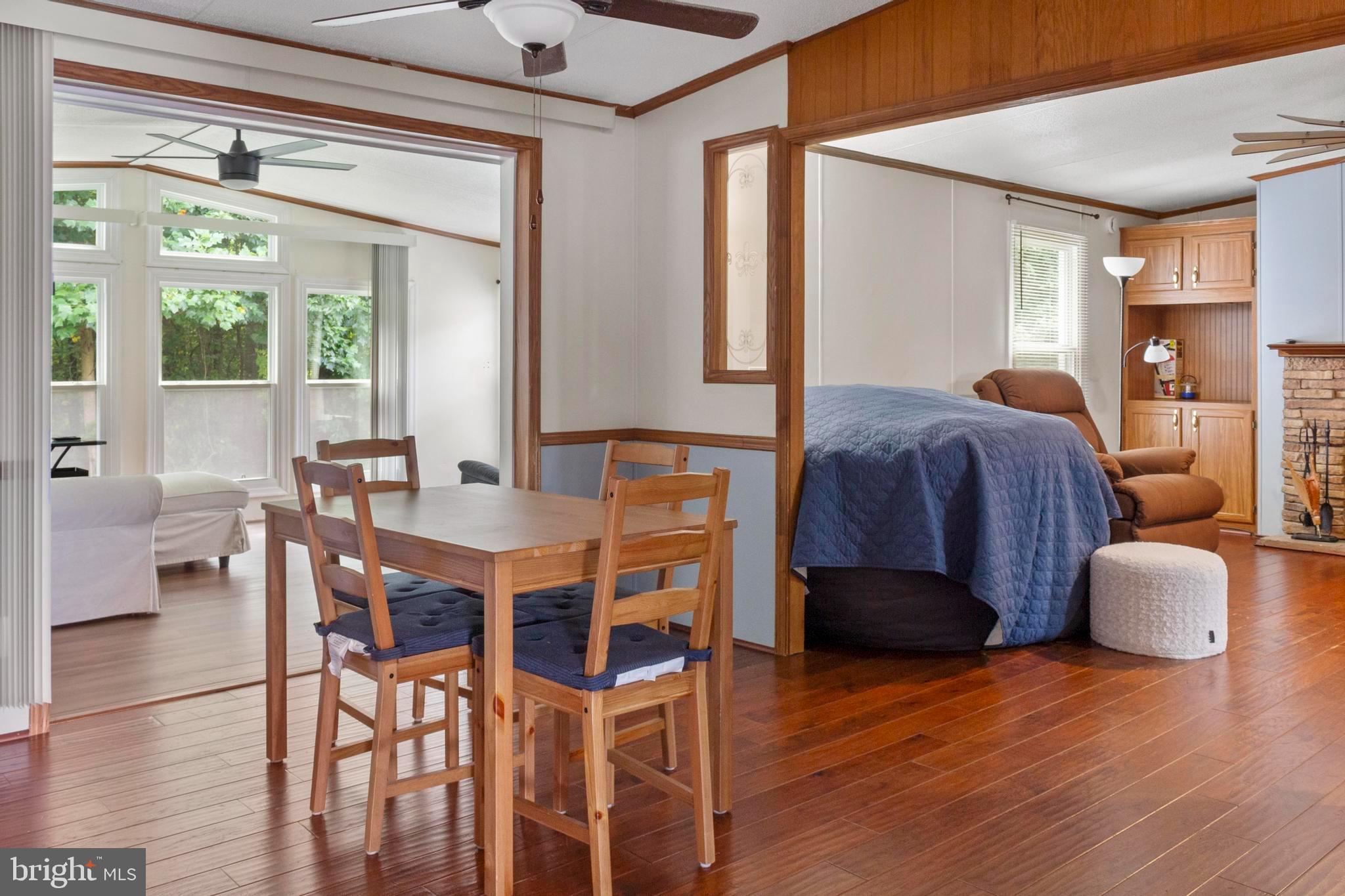 460 Sarah Anne Drive Lothian, MD 20711 - Photo 16 of 62 a living room with furniture and wooden floor