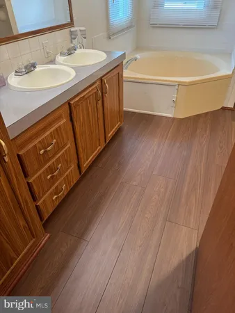 a view of a house with backyard and porch