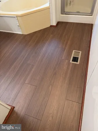 a view of a dinning table and chairs in the patio