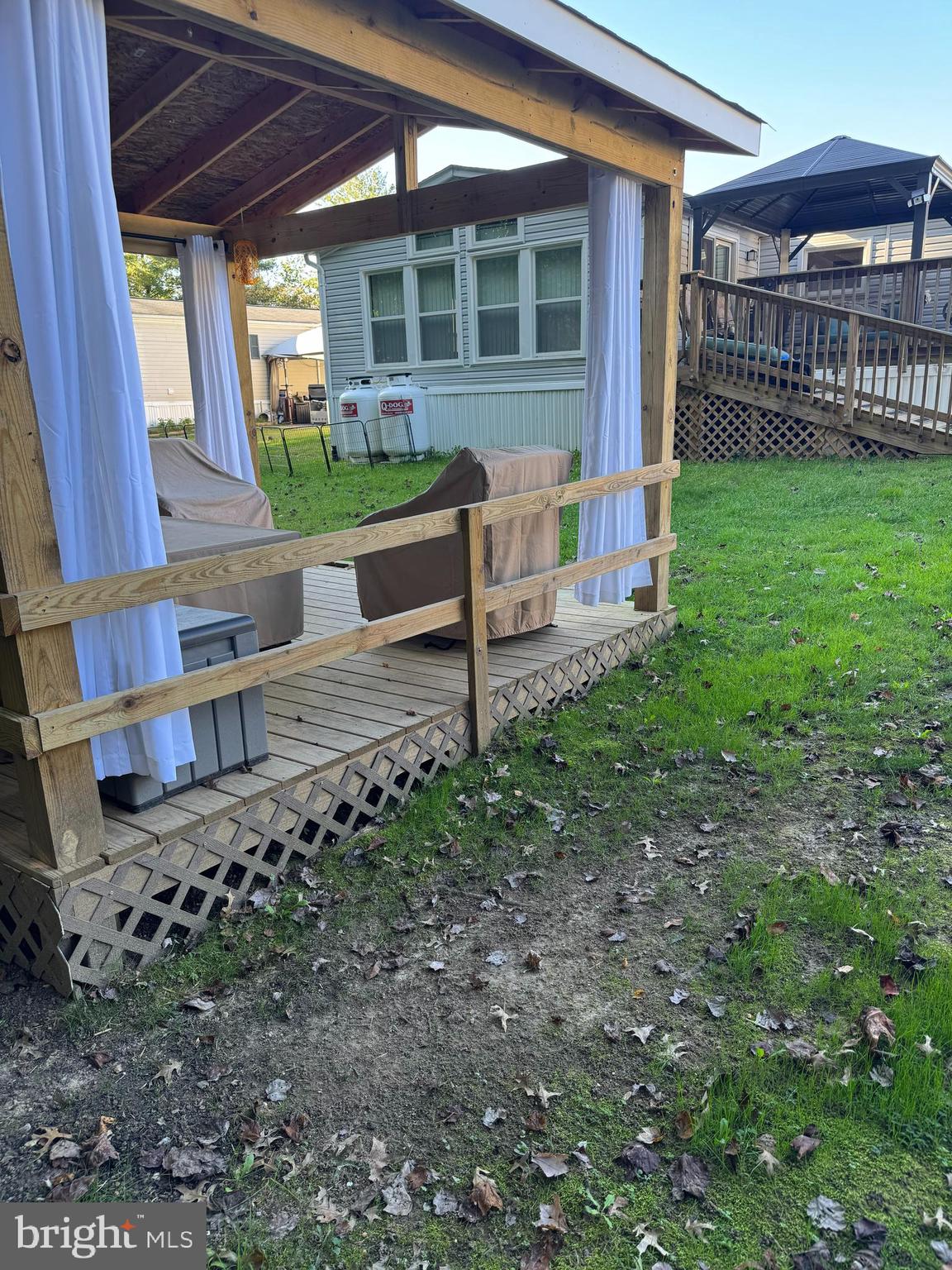460 Sarah Anne Drive Lothian, MD 20711 - Photo 41 of 62 a view of a house with backyard and sitting area