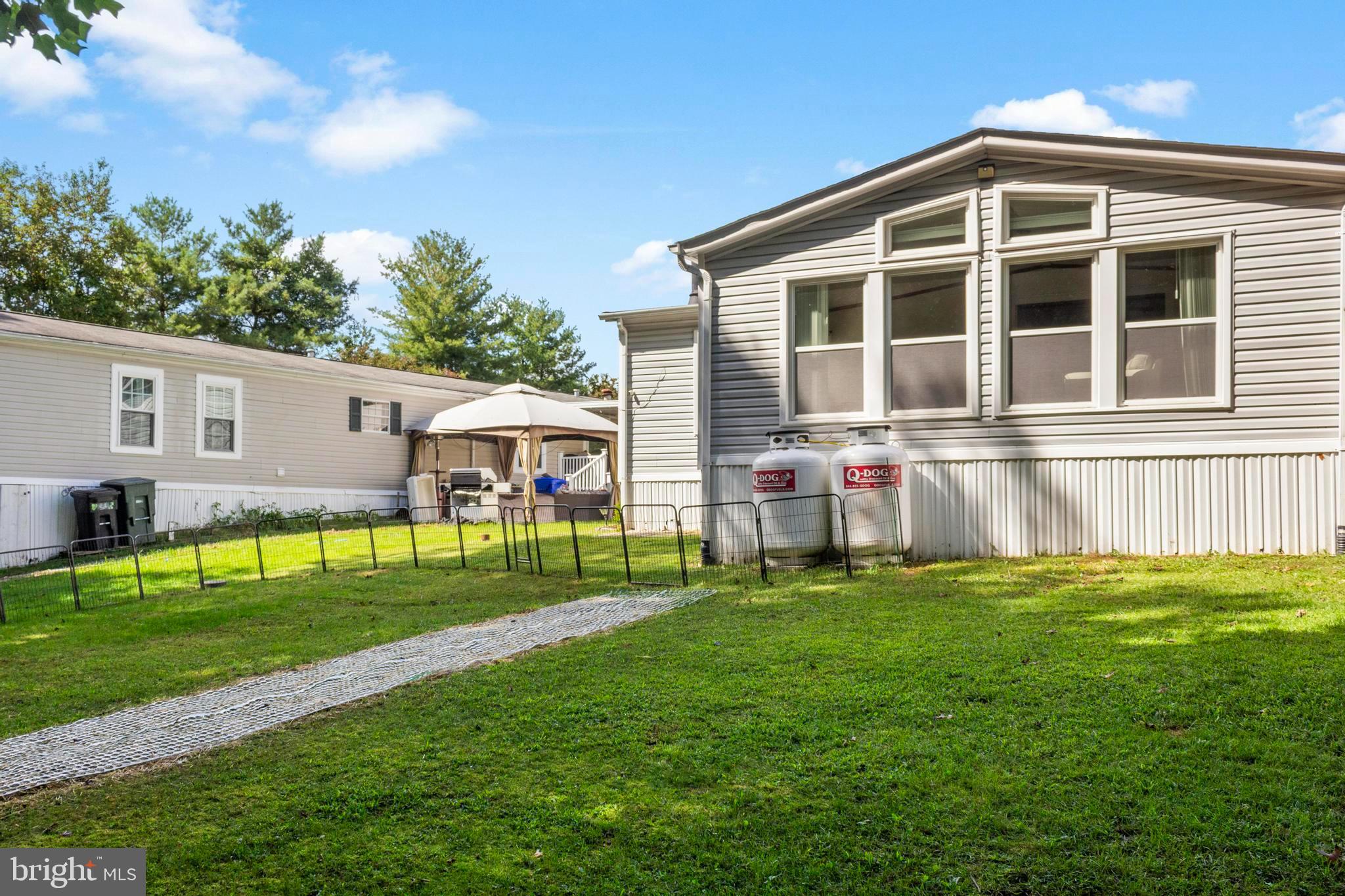 460 Sarah Anne Drive Lothian, MD 20711 - Photo 45 of 62 a view of house with a yard