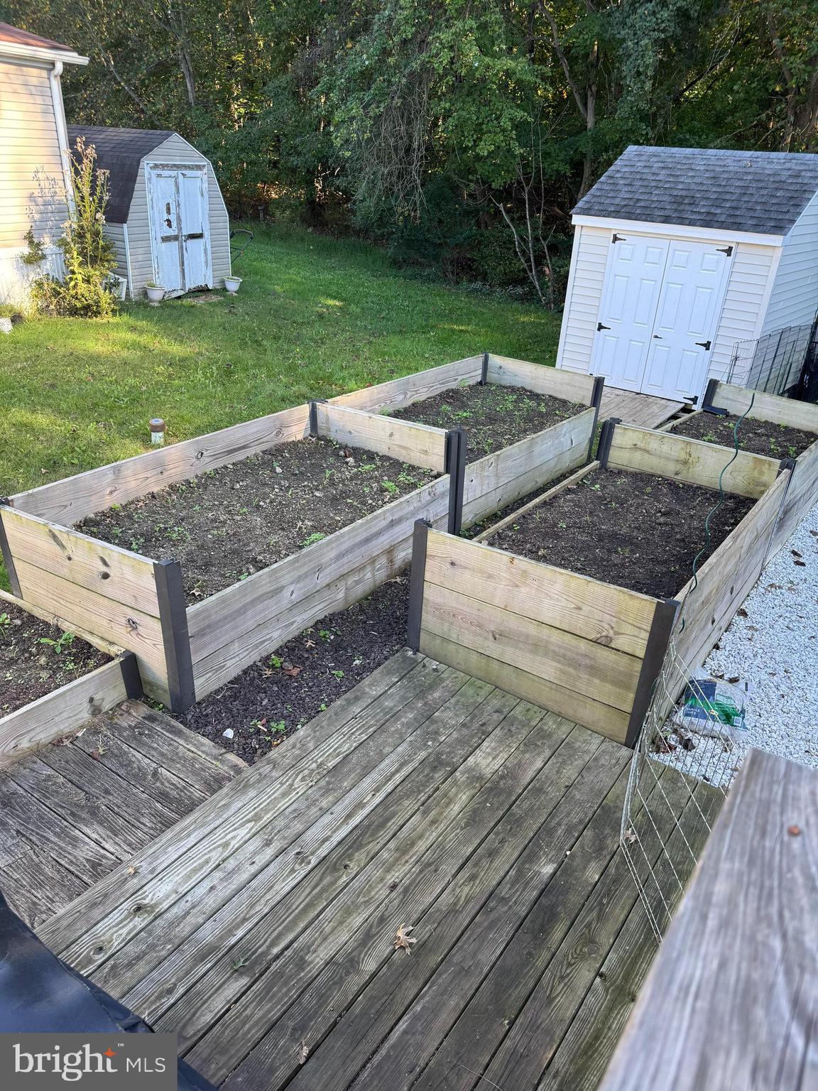 460 Sarah Anne Drive Lothian, MD 20711 - Photo 46 of 62 a view of a garden with wooden fence