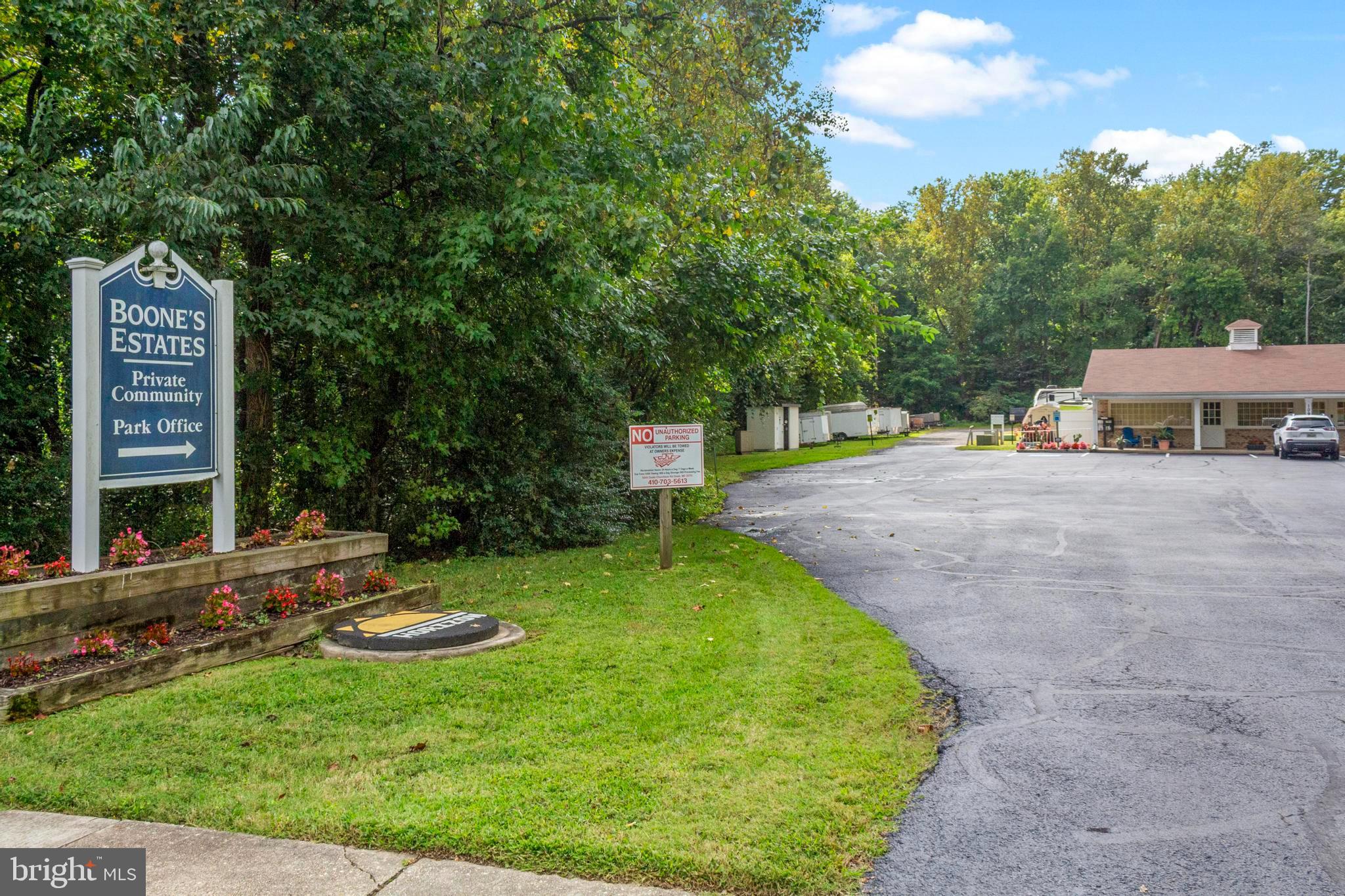 460 Sarah Anne Drive Lothian, MD 20711 - Photo 5 of 62 a view of a backyard with a garden and trees