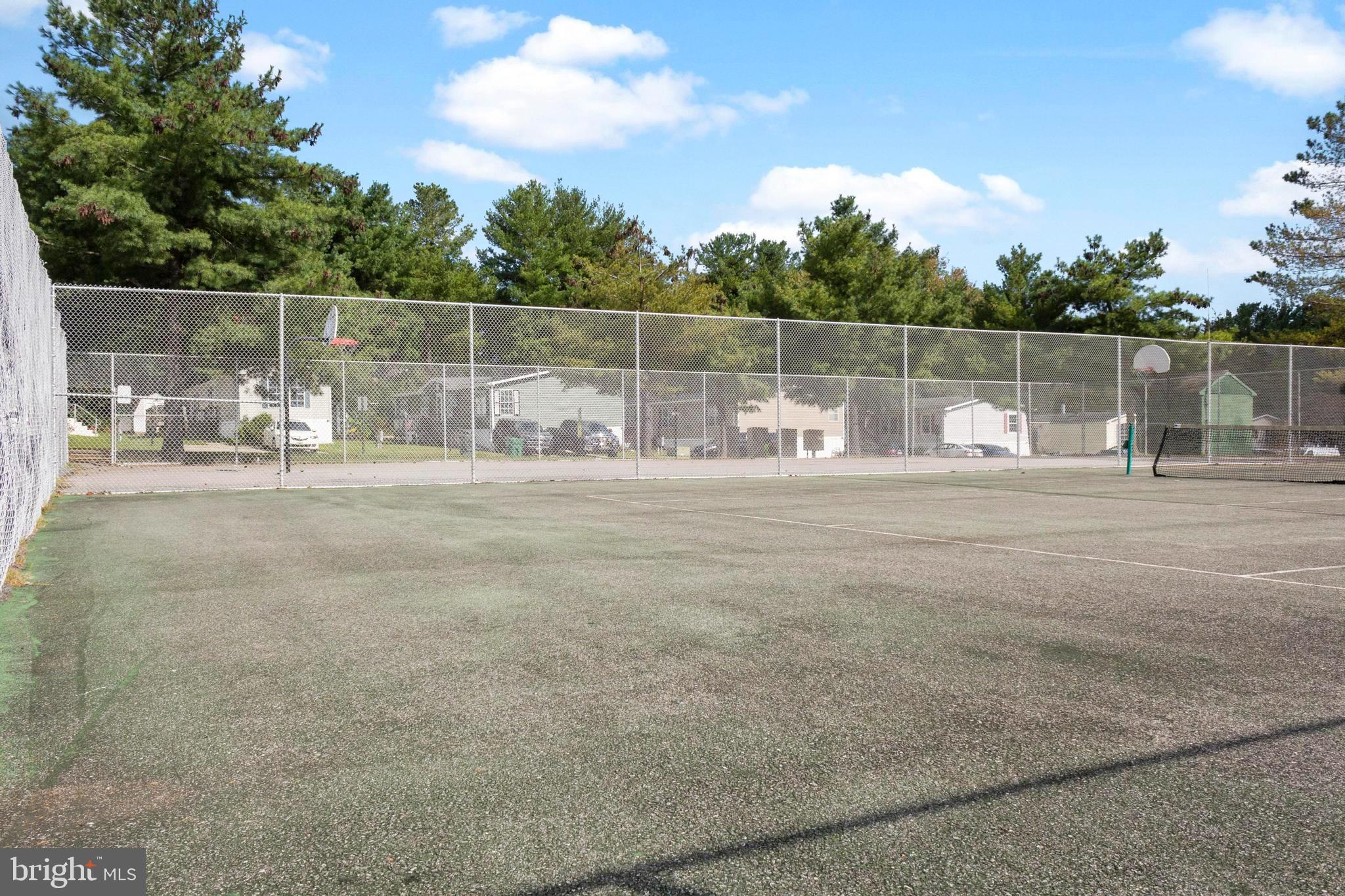 460 Sarah Anne Drive Lothian, MD 20711 - Photo 61 of 62 a backyard of a house with table and chairs