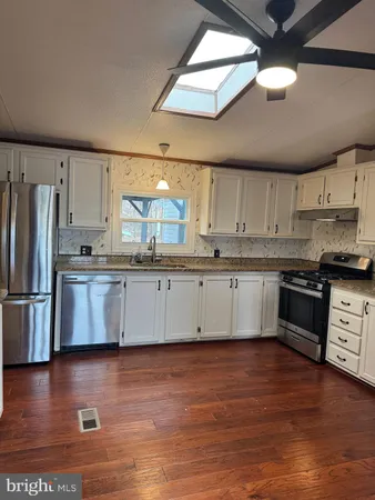 a sign on the side of a road