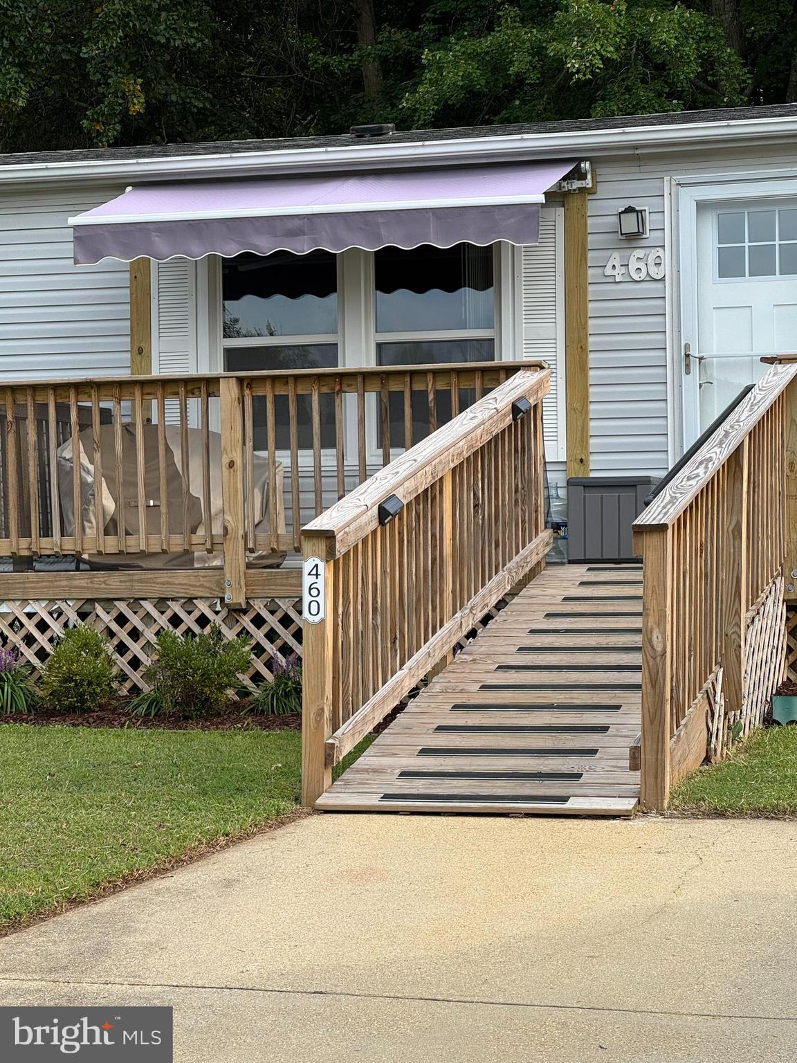 460 Sarah Anne Drive Lothian, MD 20711 - Photo 8 of 62 a view of wooden house with a small yard