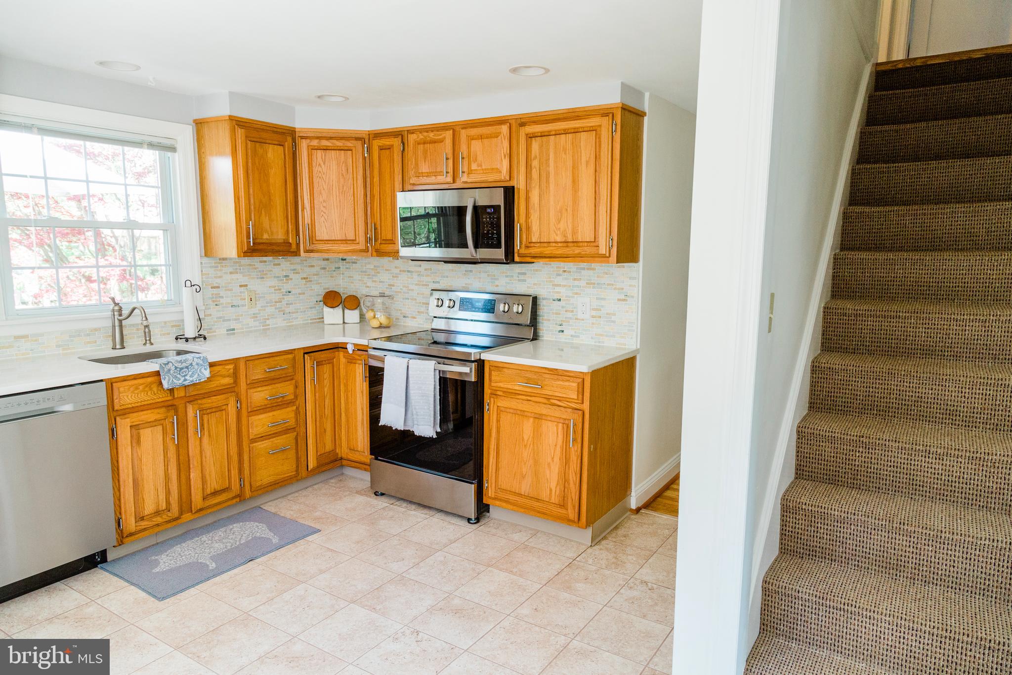116 North Fairfield Road Devon, PA 19333 - Photo 16 of 36 Kitchen and stairs to upstairs.