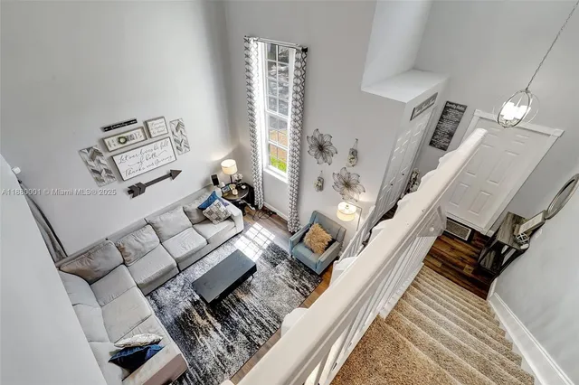 a bed room with a bed window and mirror