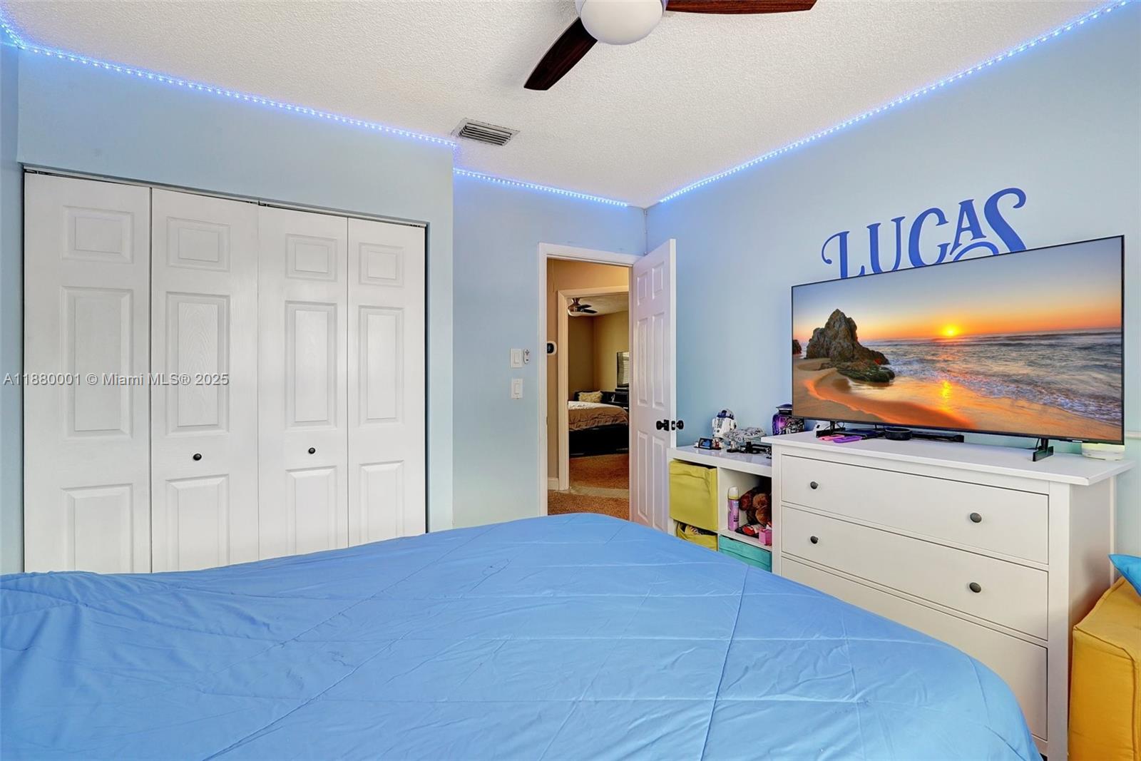 9900 Northwest 2nd Court Plantation, FL 33324 - Photo 30 of 56 a bed room with a bed and mirror