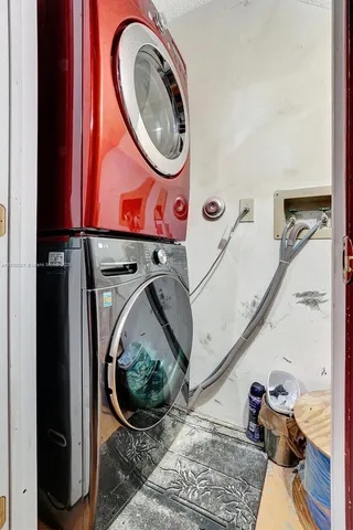 a patio with table and chairs