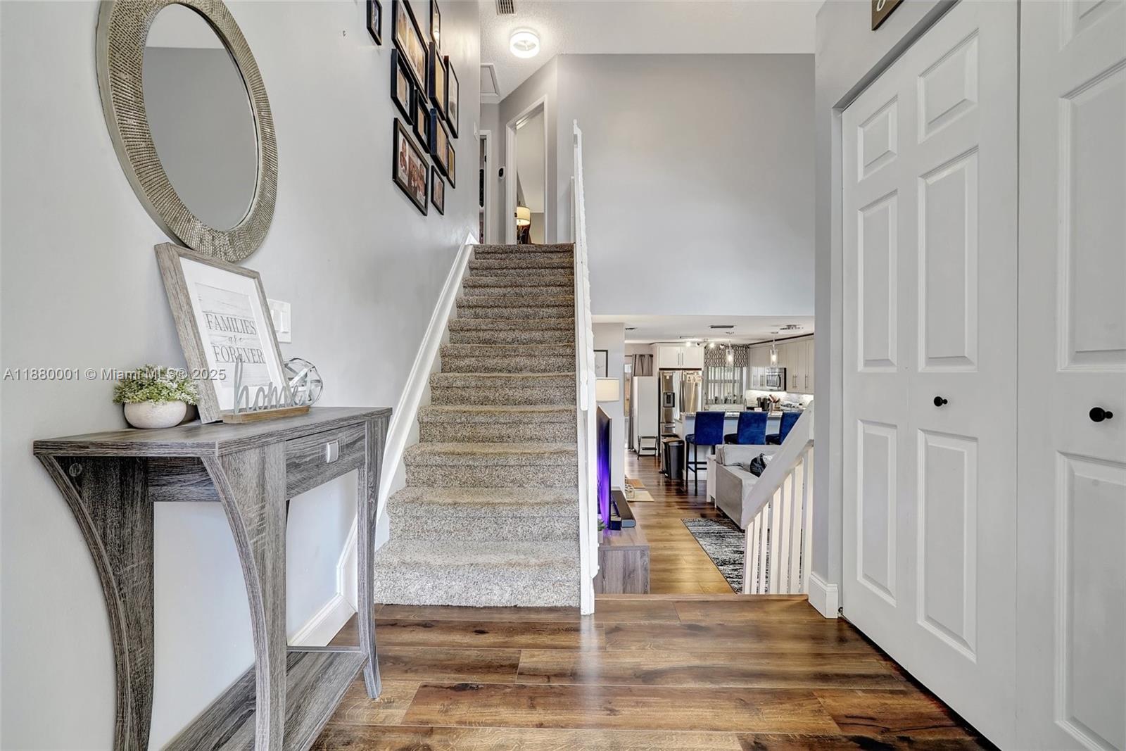 9900 Northwest 2nd Court Plantation, FL 33324 - Photo 5 of 56 a view of a hallway with wooden floor and entryway
