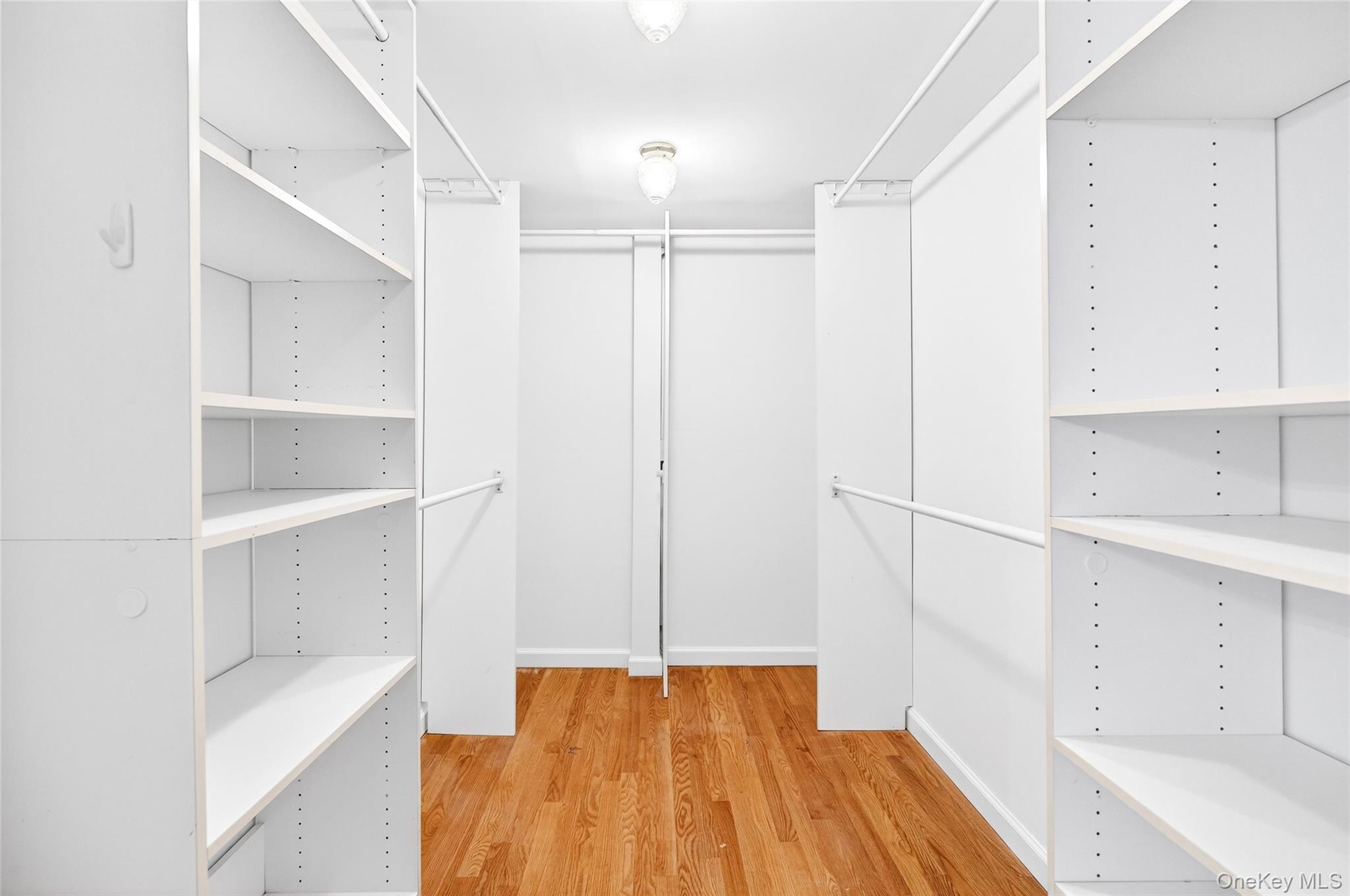 24 Old Knollwood Road White Plains, NY 10607 - Photo 12 of 49 a view of walk in closet with empty racks