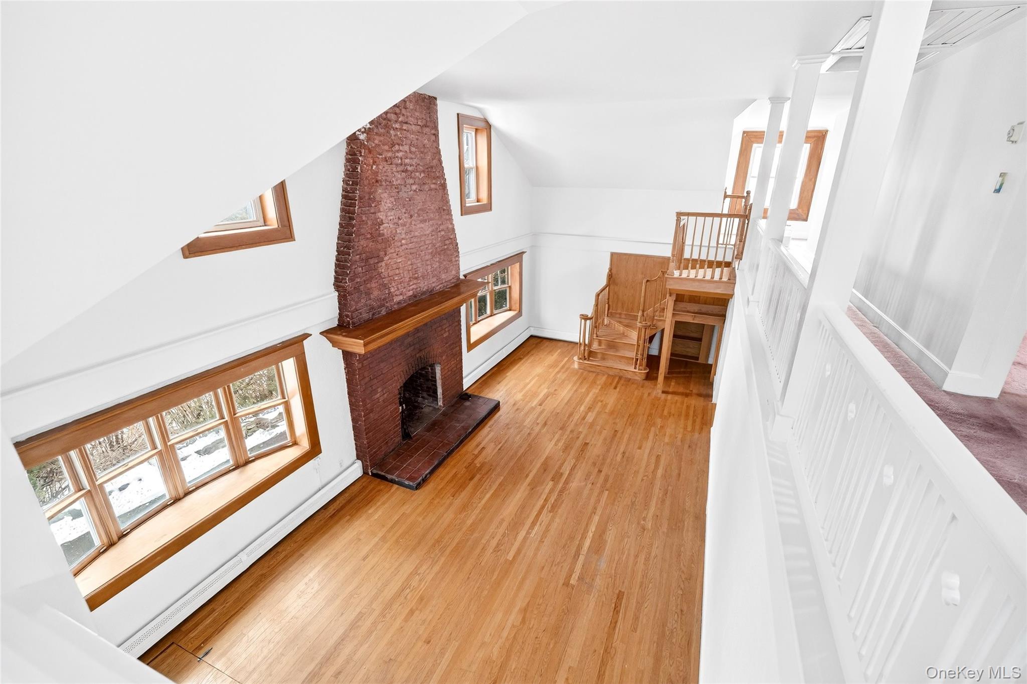 24 Old Knollwood Road White Plains, NY 10607 - Photo 30 of 49 a living room with furniture and a wooden floor