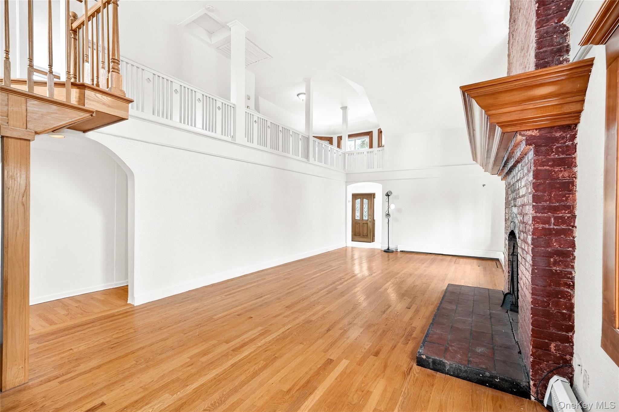 24 Old Knollwood Road White Plains, NY 10607 - Photo 4 of 49 a view of a living room with wooden floor