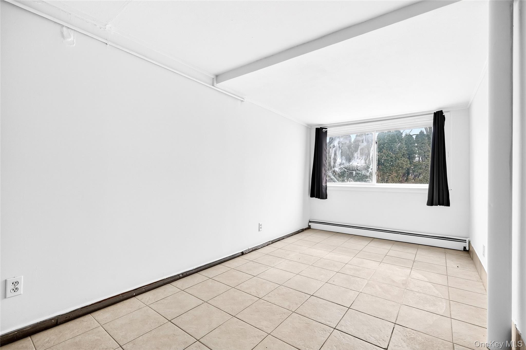 24 Old Knollwood Road White Plains, NY 10607 - Photo 41 of 49 a view of an empty room with a window