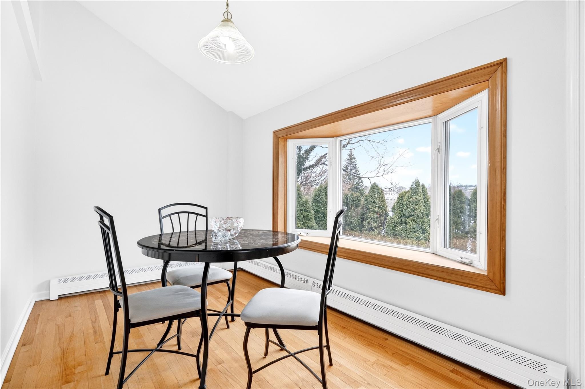 24 Old Knollwood Road White Plains, NY 10607 - Photo 8 of 49 a view of a room with furniture wooden floor and a window