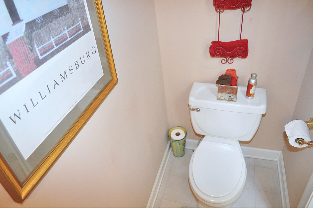 1167 Factory Hill Road Callaway, VA 24067 - Photo 23 of 80 a bathroom with a toilet sink and mirror