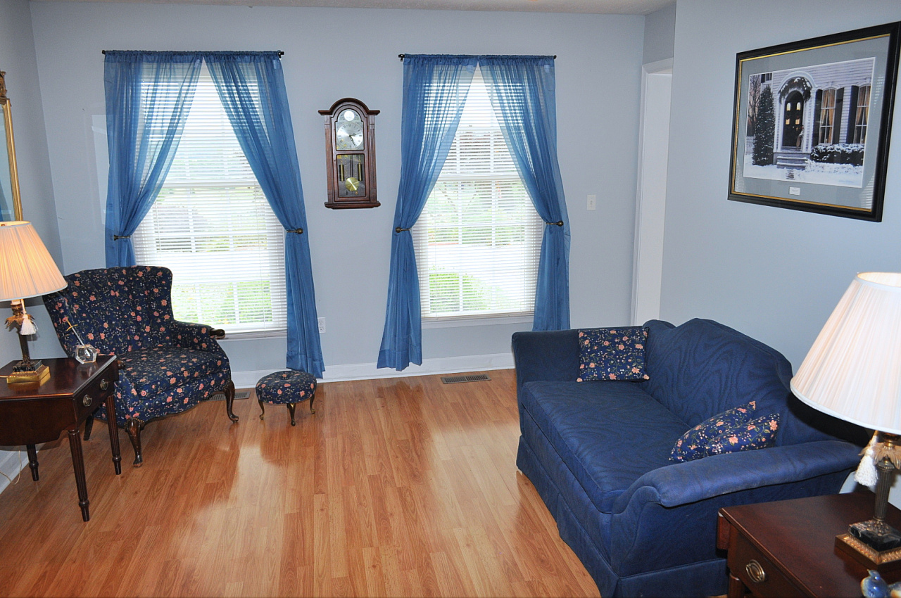 1167 Factory Hill Road Callaway, VA 24067 - Photo 26 of 80 a living room with furniture and a wooden floor