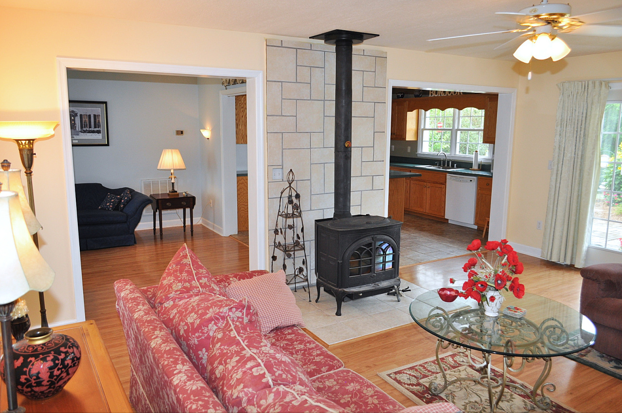 1167 Factory Hill Road Callaway, VA 24067 - Photo 32 of 80 a living room with furniture and wooden floor