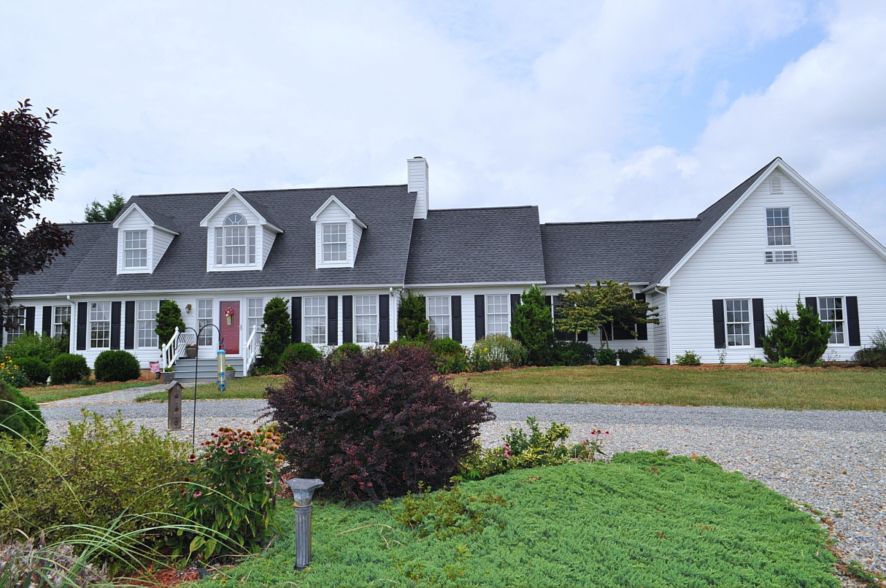 1167 Factory Hill Road Callaway, VA 24067 - Photo 5 of 80 a front view of a house with a yard
