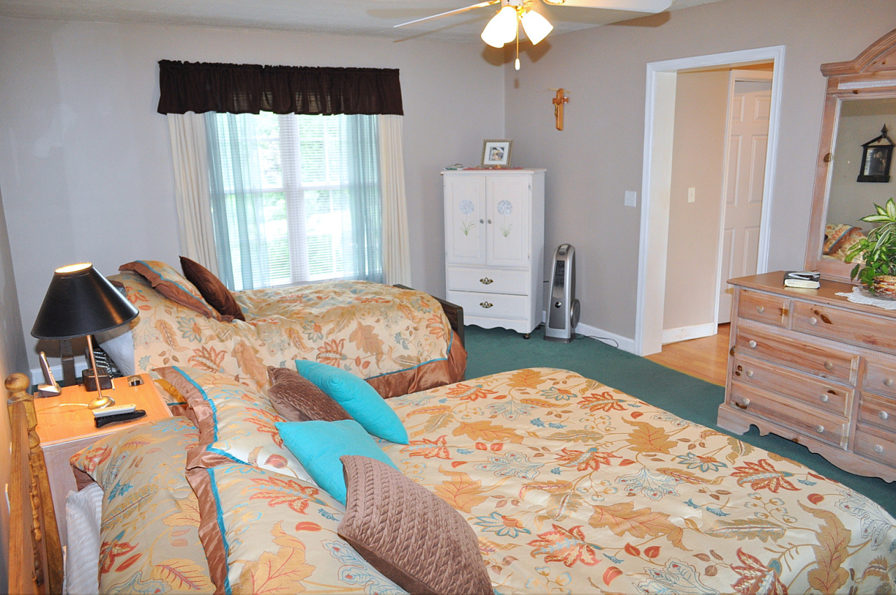 1167 Factory Hill Road Callaway, VA 24067 - Photo 45 of 80 a bedroom with two beds and a dresser