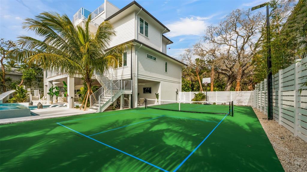 6536 Peacock Road Sarasota, FL 34242 - Photo 6 of 82 a view of a house with a yard