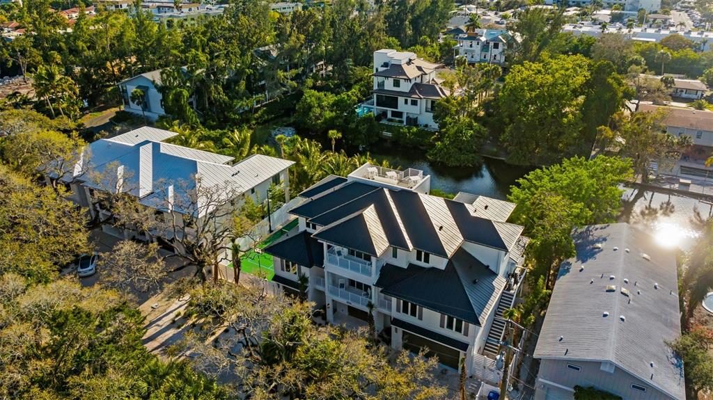 6536 Peacock Road Sarasota, FL 34242 - Photo 81 of 82 an aerial view of a house with backyard and outdoor seating