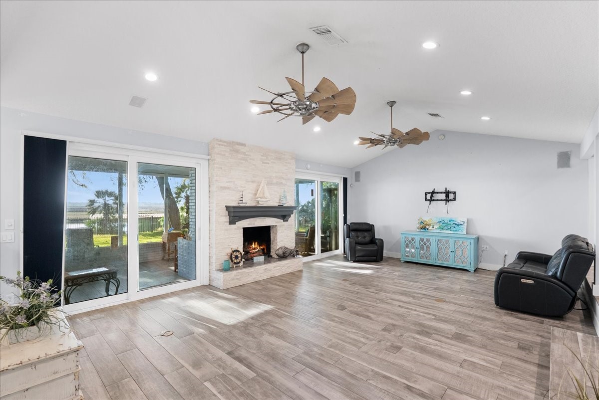 85316 Avant Road Yulee, FL 32097 - Photo 12 of 62 a living room with furniture and a fireplace