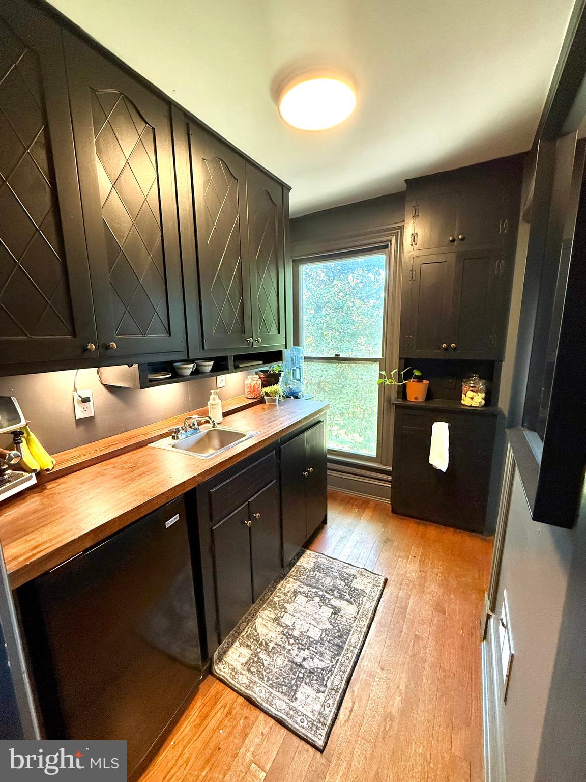 4 South 1st Street Denton, MD 21629 - Photo 82 of 123 a kitchen with a sink appliances and cabinets