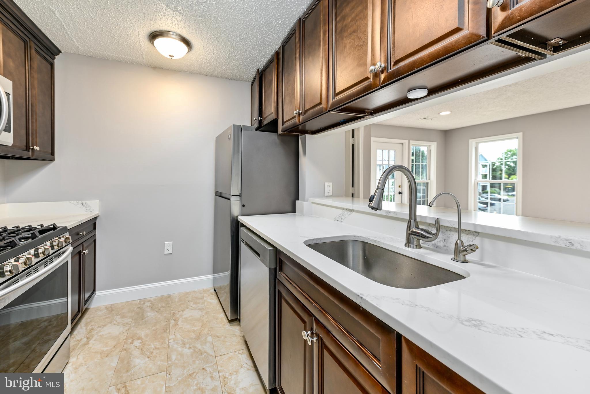 20991 Timber Ridge Terrace, Unit 204 Ashburn, VA 20147 - Photo 11 of 27 Sink and Energy Star Dishwasher
