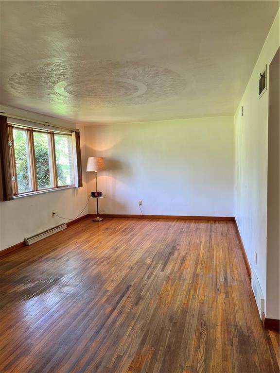 880 Pizza Barn Road Blairsville, PA 15717 - Photo 38 of 44 a view of empty room with wooden floor and fan