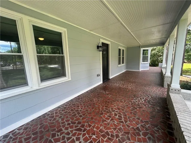 a view of a house with a porch