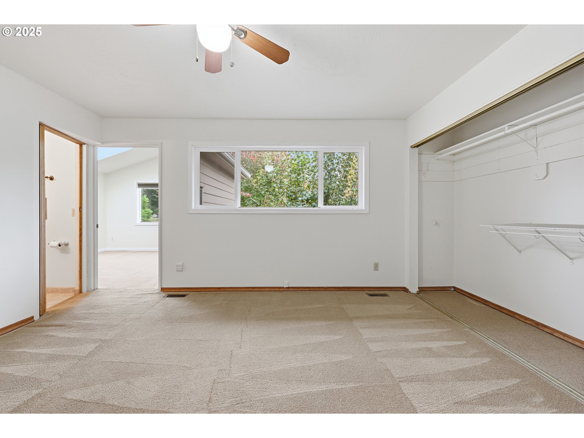 1920 Northeast View Court Gresham, OR 97030 - Photo 26 of 48 a view of an empty room with windows