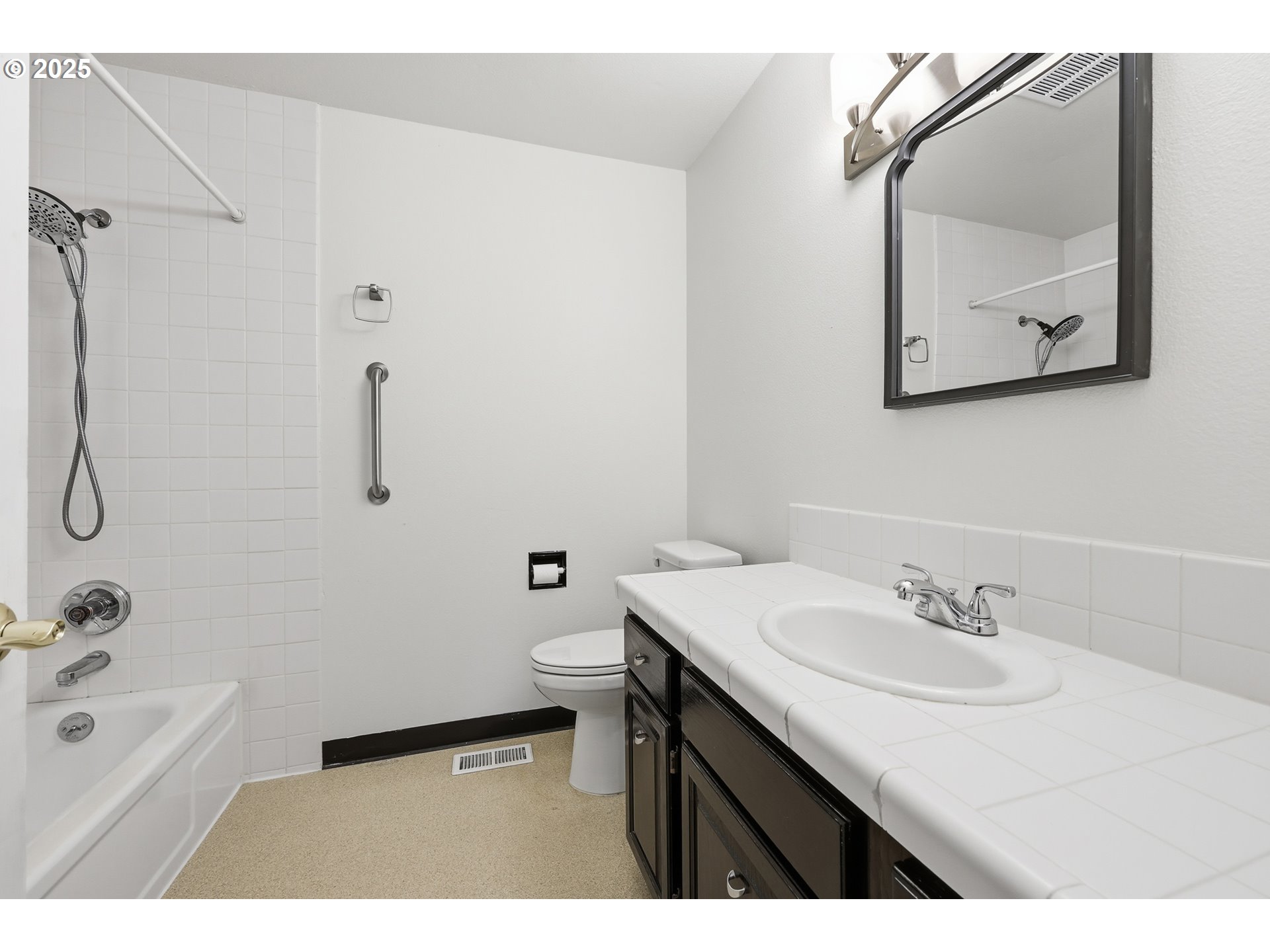 1920 Northeast View Court Gresham, OR 97030 - Photo 32 of 48 a bathroom with a sink mirror toilet and bathtub