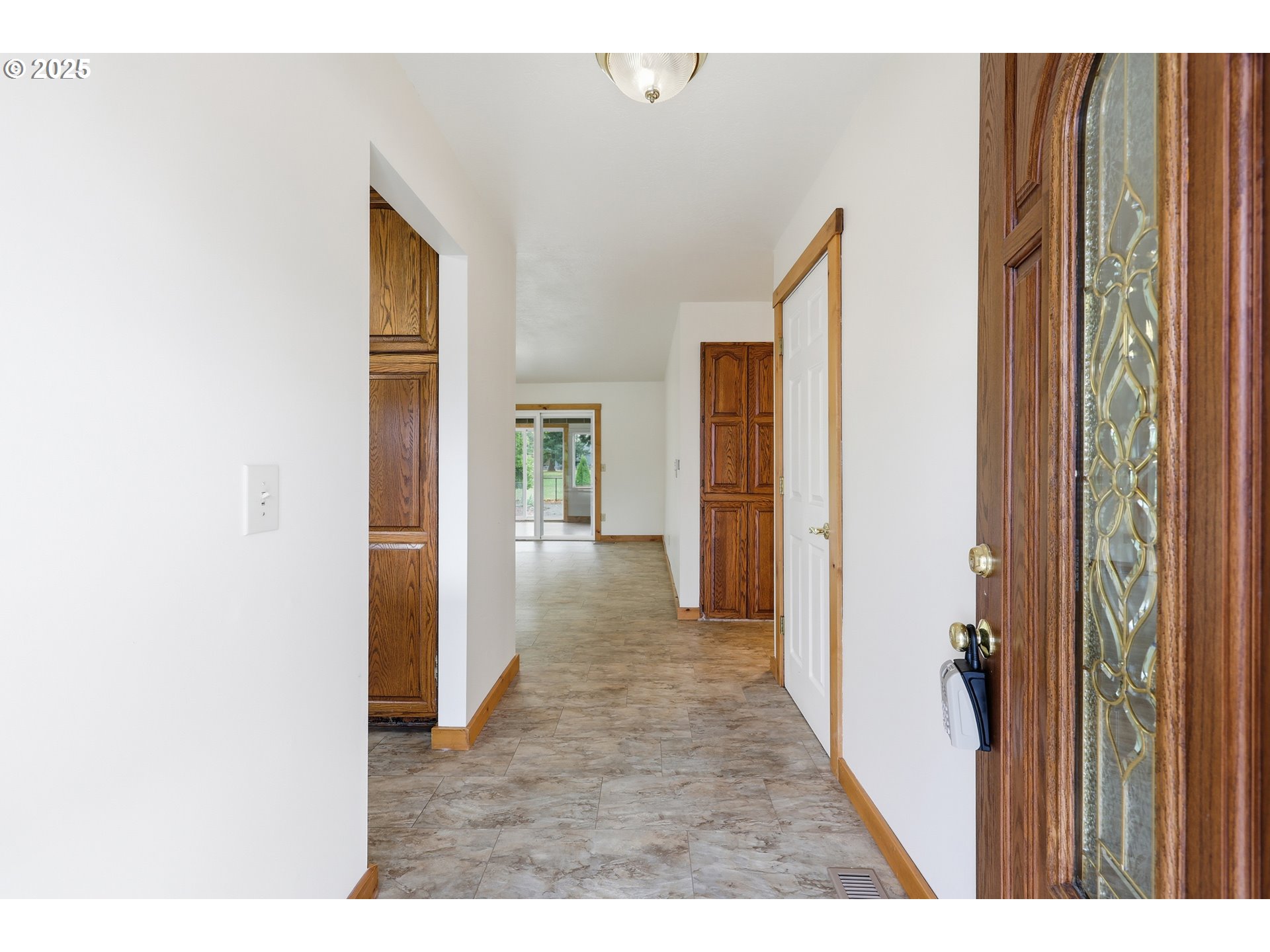 1920 Northeast View Court Gresham, OR 97030 - Photo 7 of 48 a view of a hallway with wooden floor