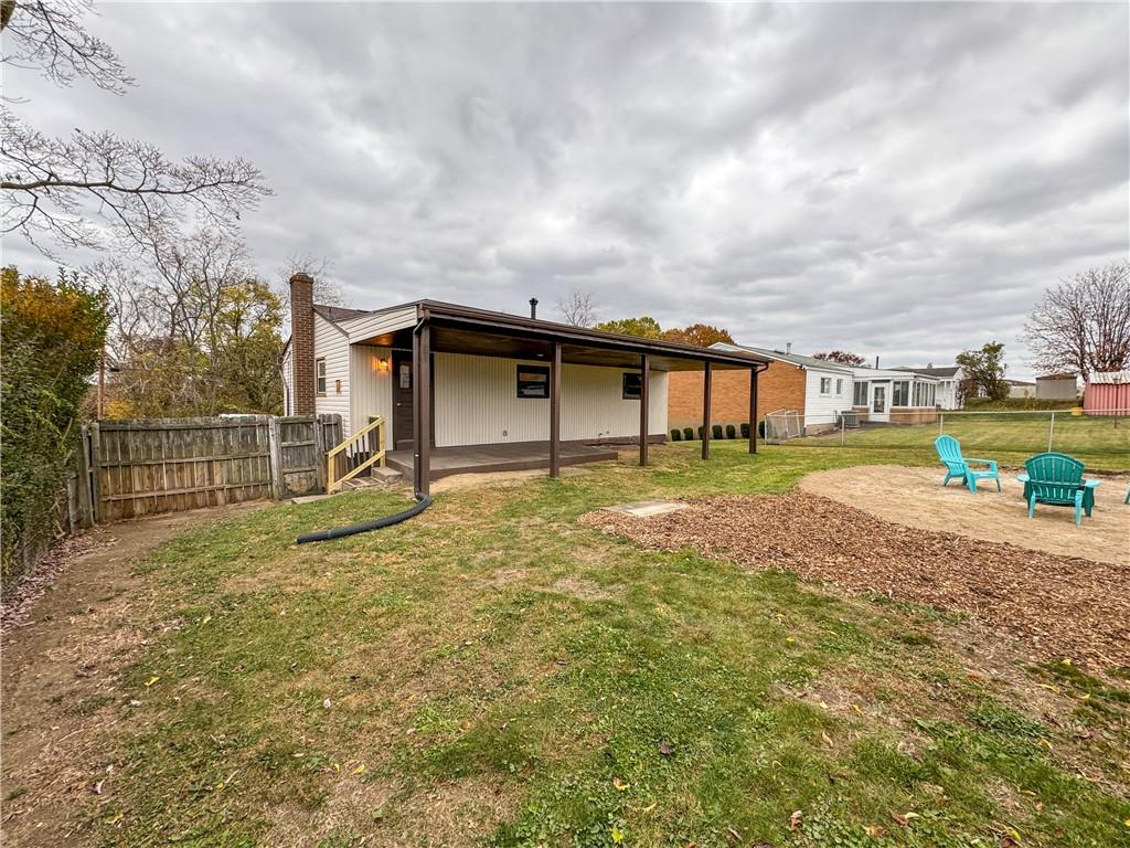 152 William Circle McKees Rocks, PA 15136 - Photo 2 of 16 a view of a house with backyard and sitting area