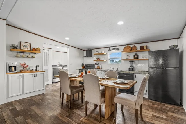 a view of a dining room with furniture