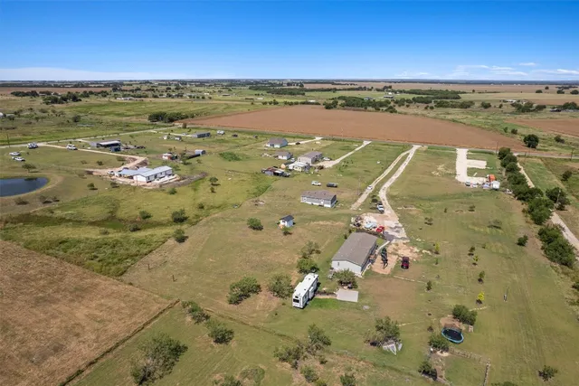 an aerial view of beach with ocean view
