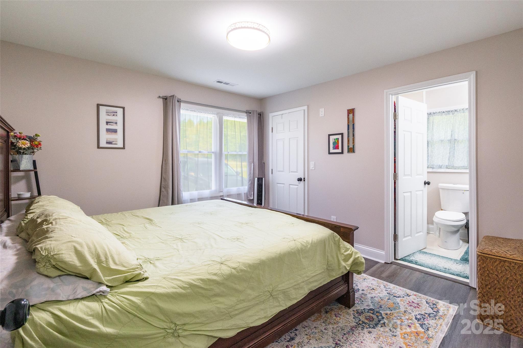 749 Meadowbrook Road Chester, SC 29706 - Photo 14 of 33 a bedroom with a bed and a view of bathroom