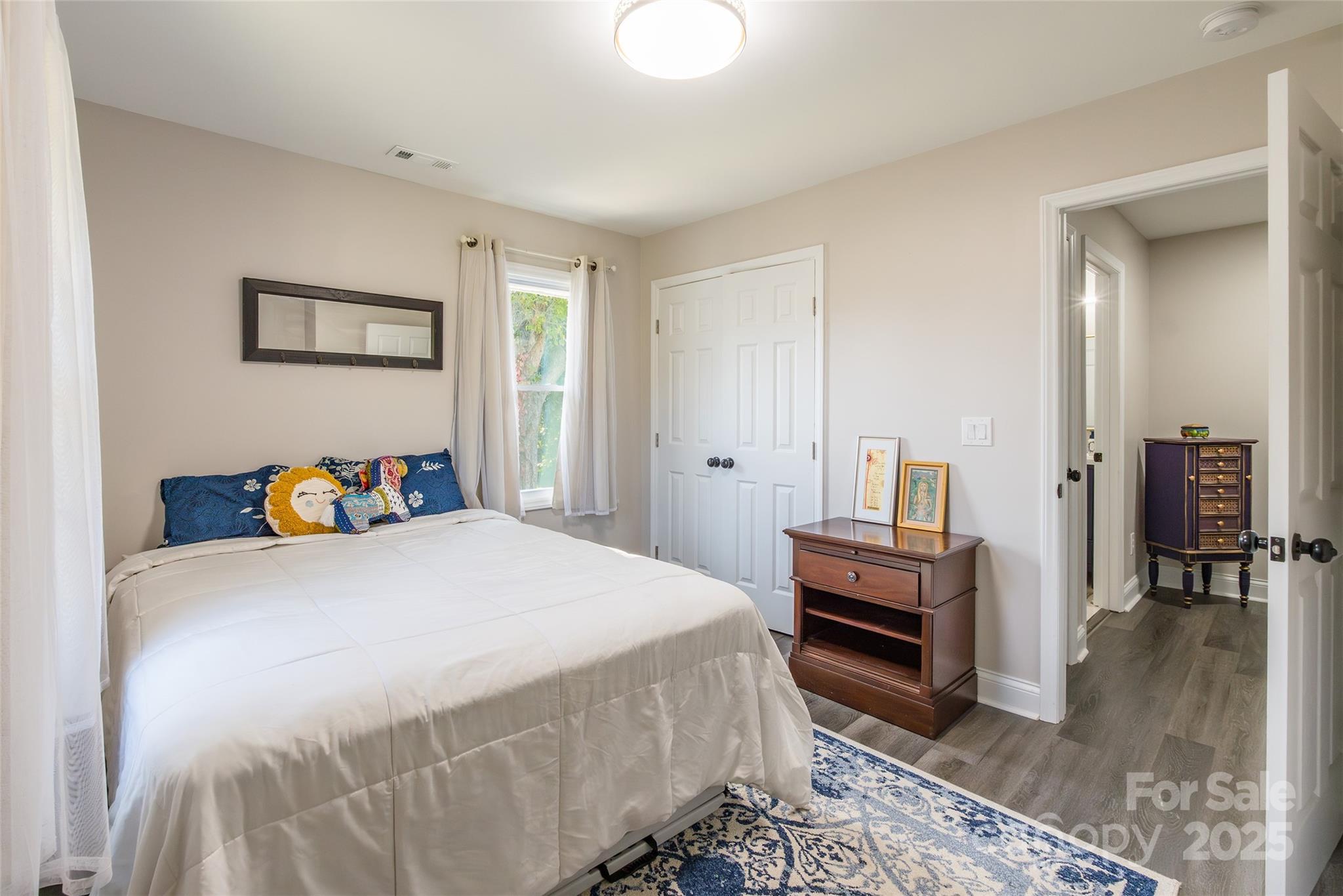 749 Meadowbrook Road Chester, SC 29706 - Photo 19 of 33 a bedroom with a bed and a dresser